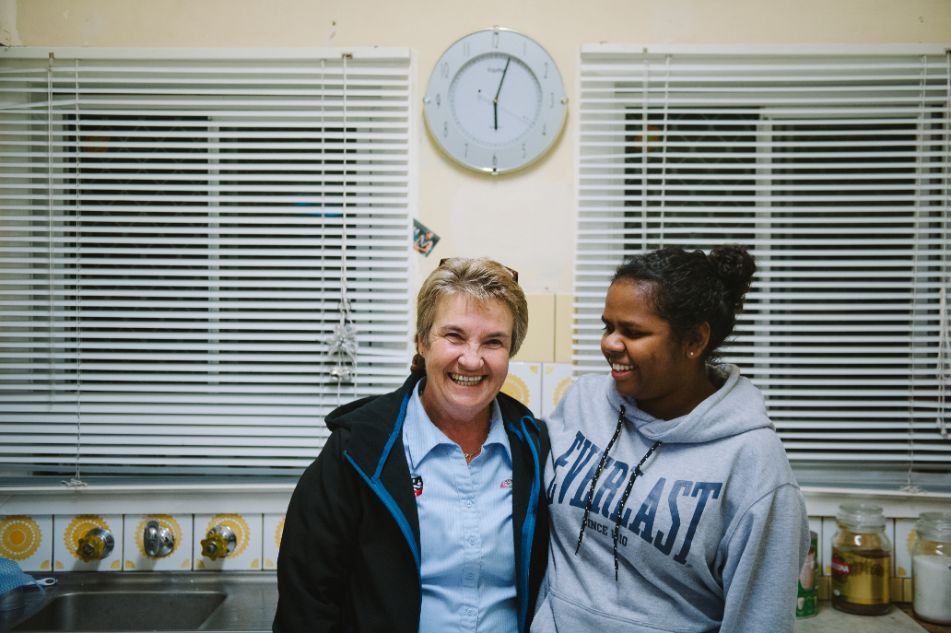 Muriel and a caseworker smiling