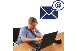 A person using a laptop to send an email. Above them is an email icon.